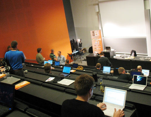 Participants at GR8Conf during a presentation